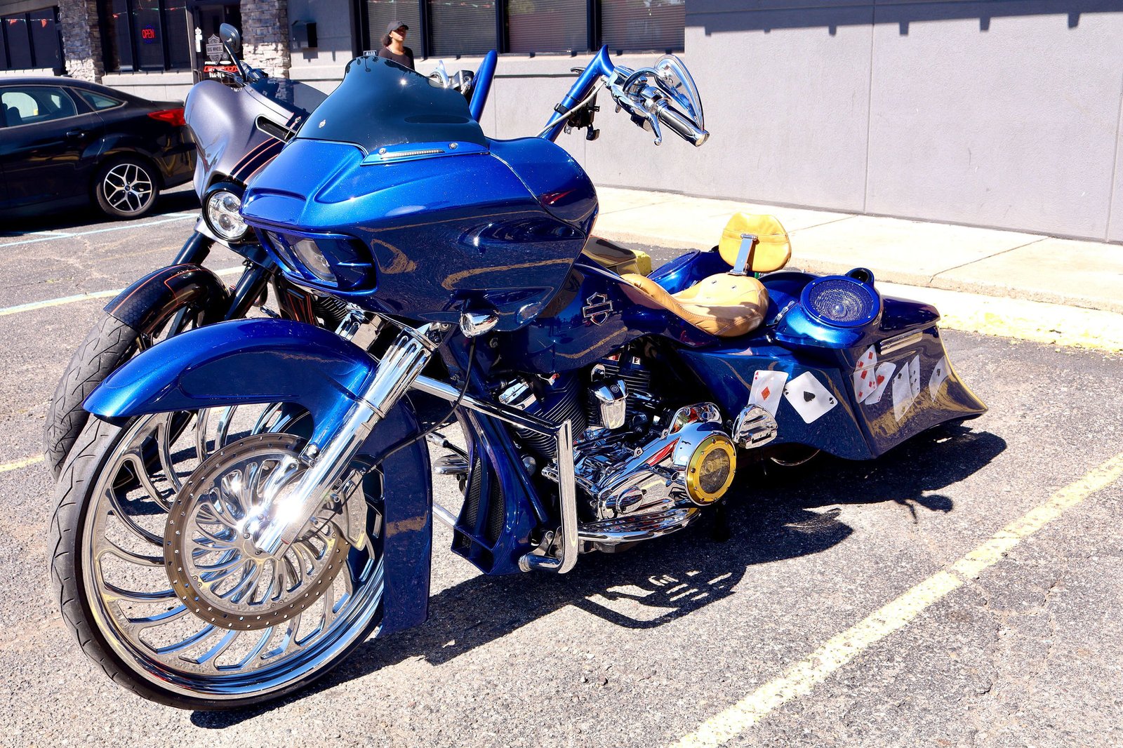 Blue custom motorcycle with chrome front wheel